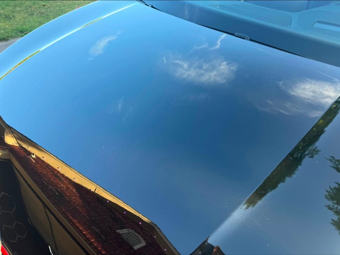 Deep gloss on a black VW GTI hood after ceramic coating